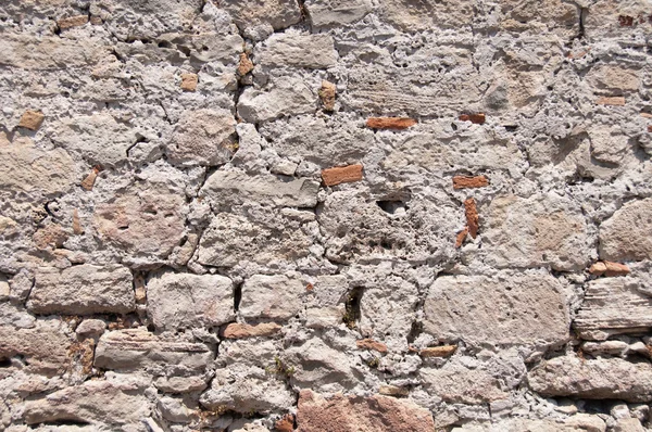 Bakgrund från en gammal gammal stenmur — Stockfoto