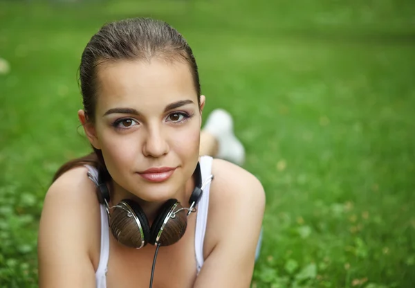 Beautiful young girl with headphones — Stock Photo, Image
