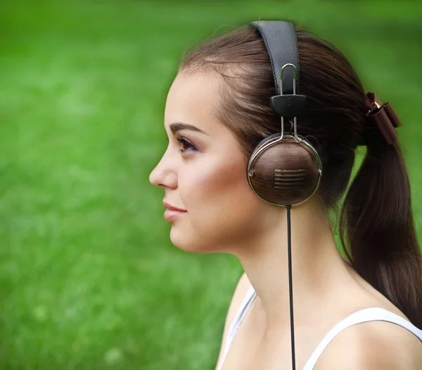 Beautiful young girl with headphones — Stock Photo, Image