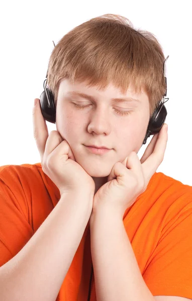 Jongen luisteren muziek — Stockfoto