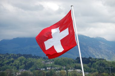 Beautiful mountain with Swiss flag - Swiss Alps clipart