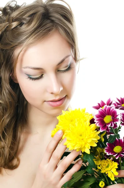 The girl with beautiful hair with chrysanthemum — Stock Photo, Image