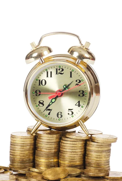 Reloj despertador y dinero aislados sobre fondo blanco — Foto de Stock