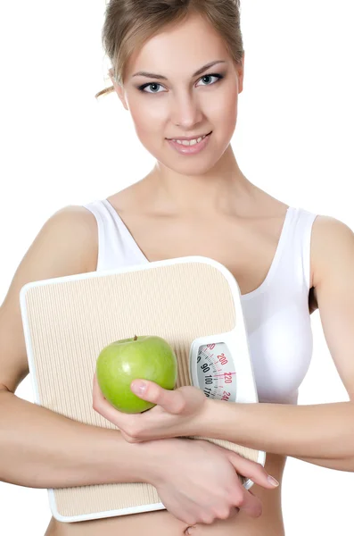 Красивая девушка с яблоком в руке — стоковое фото