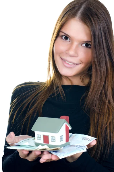 Biznes kobieta z domu zabawka i banknoty — Zdjęcie stockowe
