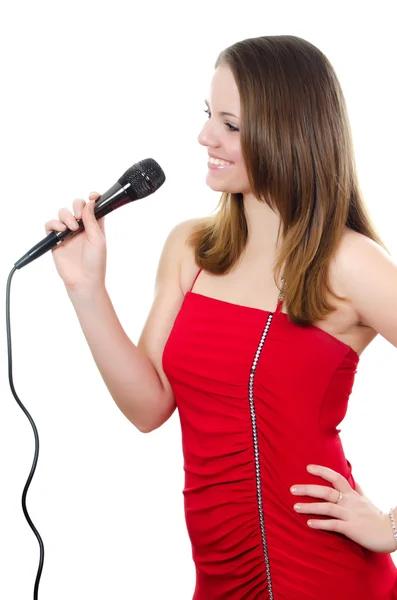 Mädchen mit einem Mikrofon isoliert auf weiß — Stockfoto