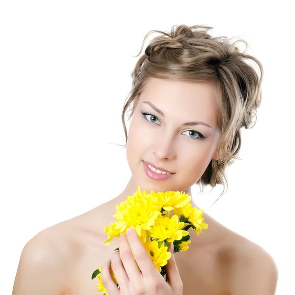 The girl with beautiful hair with yellow chrysanthemum — Stock Photo, Image