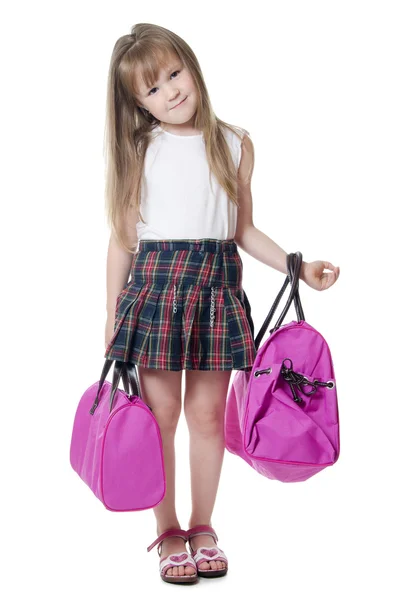 A kislány egy lila zsák elszigetelt — Stock Fotó