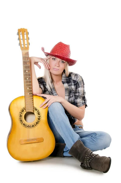 Het mooie meisje in een cowboyhoed geïsoleerd — Stockfoto