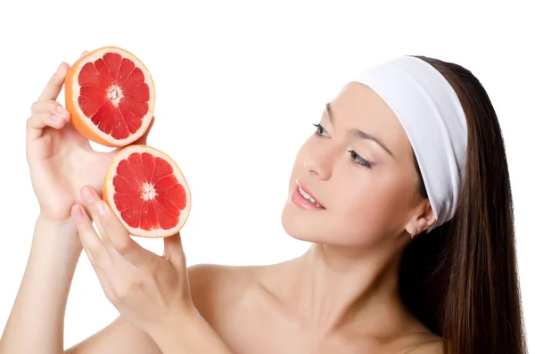 A gyönyörű nő, a grapefruit — Stock Fotó