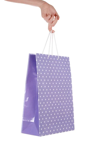 Světlé dárkové tašky v ruce izolovaných na bílém — Stock fotografie