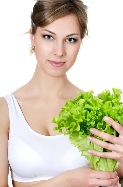 Krásná dívka s zeleným salátem — Stock fotografie