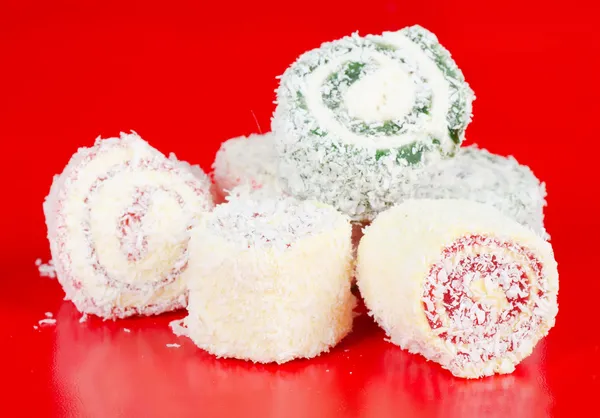 Turkish delight on red background — Stock Photo, Image