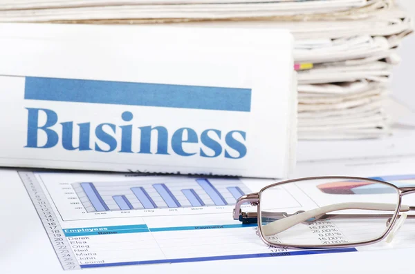 Business the newspaper with chart — Stock Photo, Image