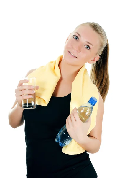 Bir havlu ve bir su şişesi ile spor kız — Stok fotoğraf