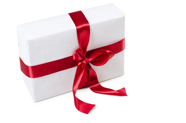Box with a gift with a red tape — Stock Photo, Image