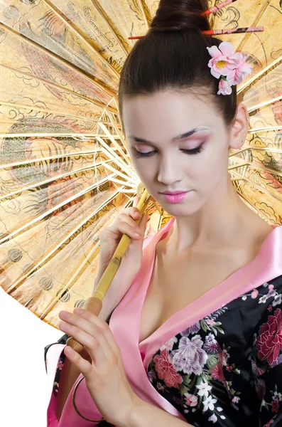 Den vackra flickan med en sminkning av japanska — Stockfoto