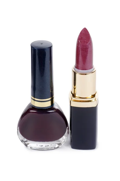 Nagellack und Lippenstift in lila Farbe isoliert — Stockfoto