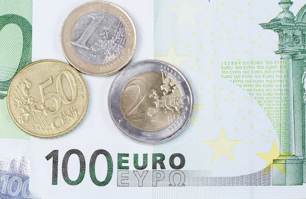Diversos billetes y monedas en euros — Foto de Stock