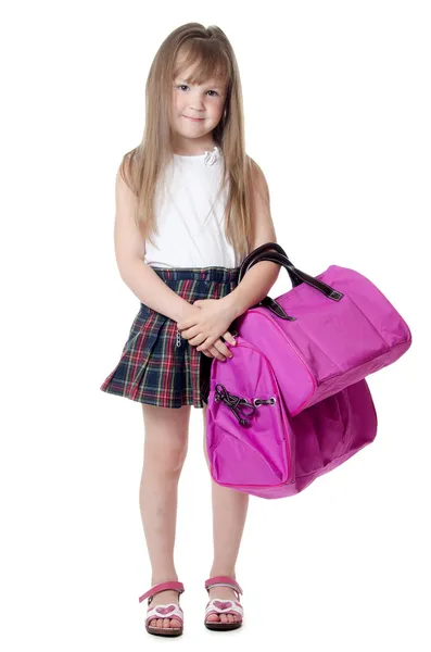 La bambina con una borsa lilla isolata — Foto Stock