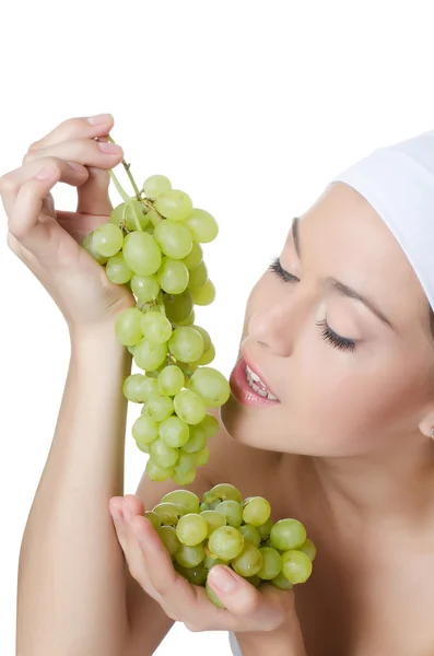The beautiful woman with grapes — Stock Photo, Image