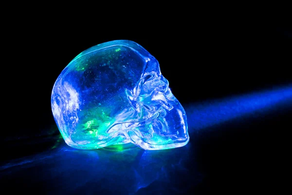 Light blue glass skull — Stock Photo, Image