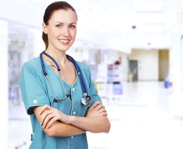 Mujer doctora sonriéndote — Foto de Stock