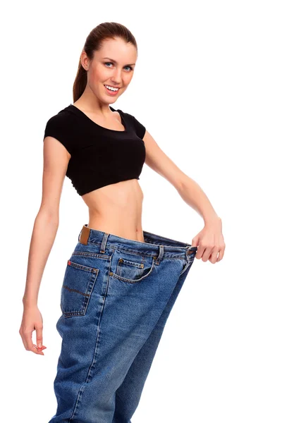 Menina demonstrando perda de peso — Fotografia de Stock