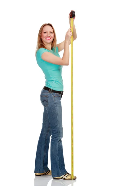 Smiling girl with a tape measure — Stock Photo, Image