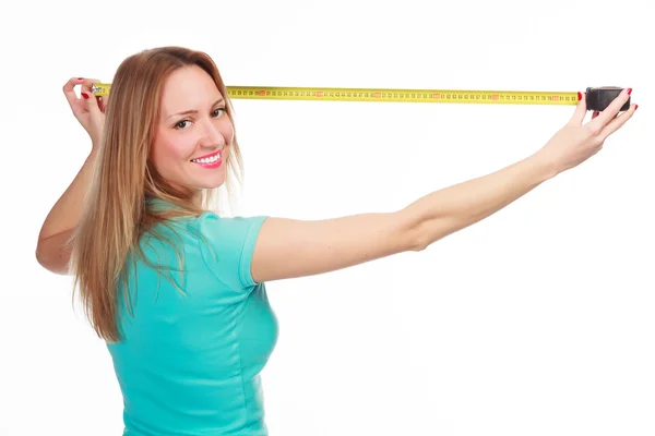 Happy girl with a tape measure — Stock Photo, Image