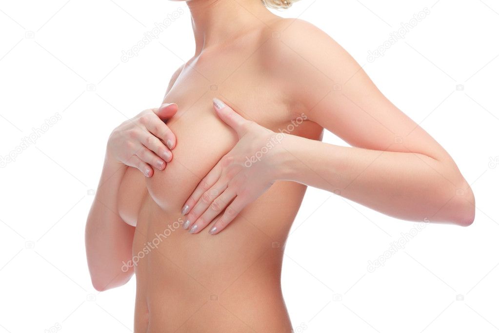 Woman examining breast, isolated on white