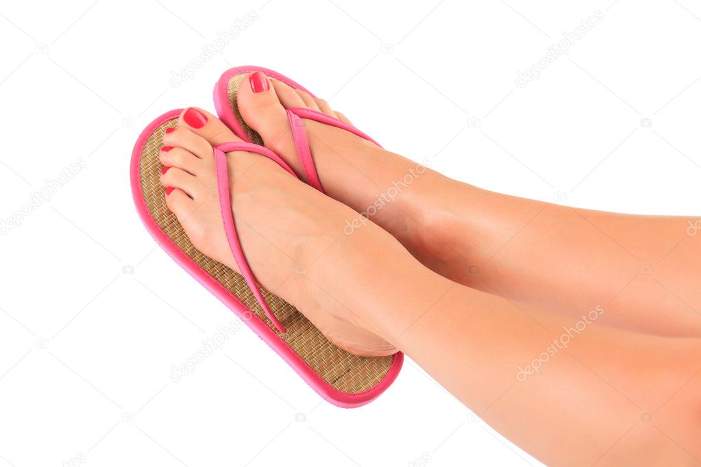 Female feet with flip-flops, isolated on white background. Stock Photo by  ©Nobilior 11337379