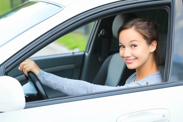 Cute girl in a car — Stock Photo, Image