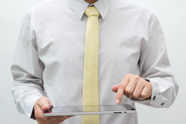 Affärsman som håller TabletPC — Stockfoto