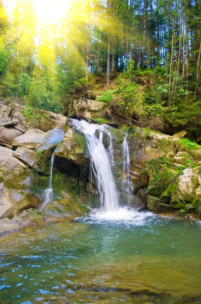 stock image Waterfall on a mountain river in the spring