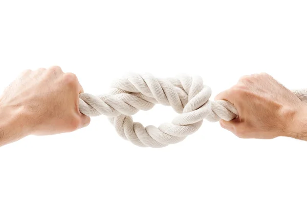 Hands tied knot on a rope — Stock Photo, Image