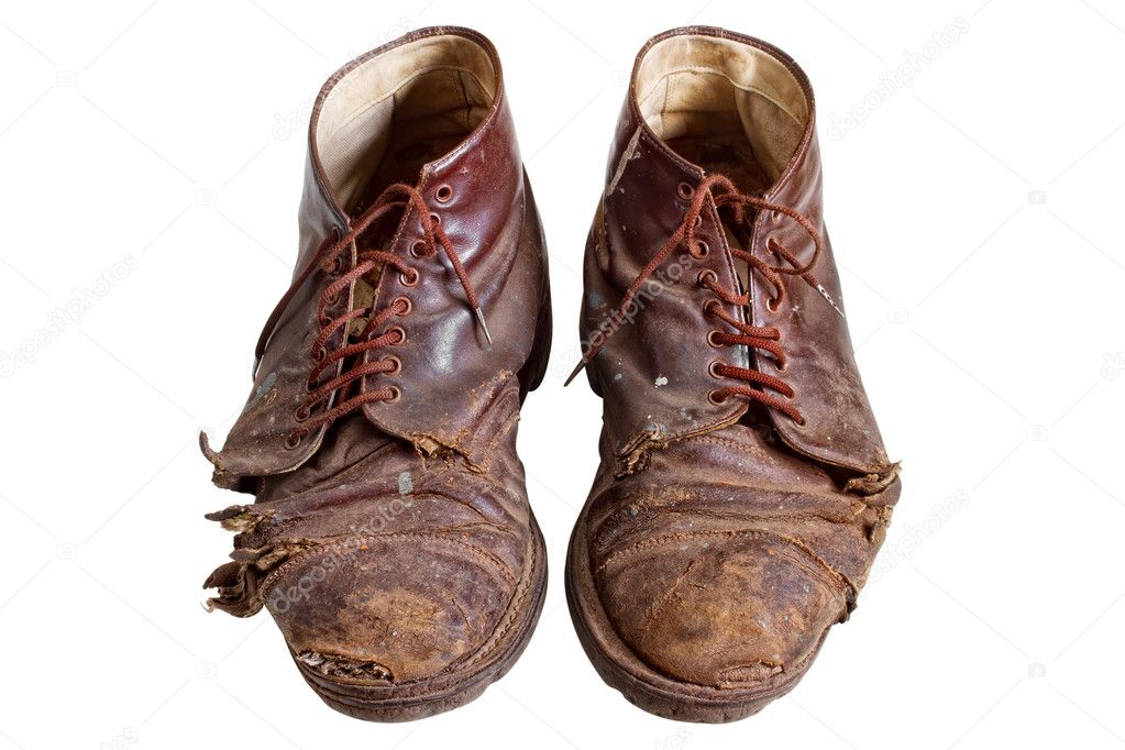 Old worn out boots, isolated