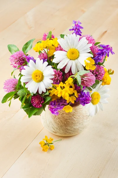 Vase with bouquet of healing herbs and flowers — Stock Photo, Image