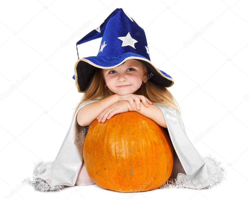 Girl in blue witch's hat with silver stars and pumpkin
