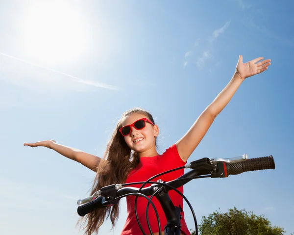 Teenage girl on a bicycle — Stock Photo, Image