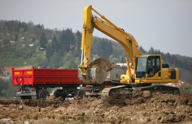 Digger navlun araba üzerinde kir ele