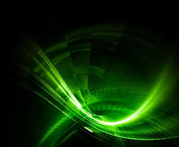 Зеленый свет формируется на темном фоне — стоковое фото