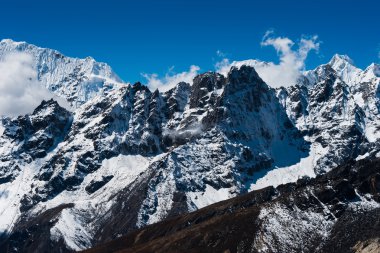 Mountain ridge scene viewed from Renjo pass in Himalayas clipart