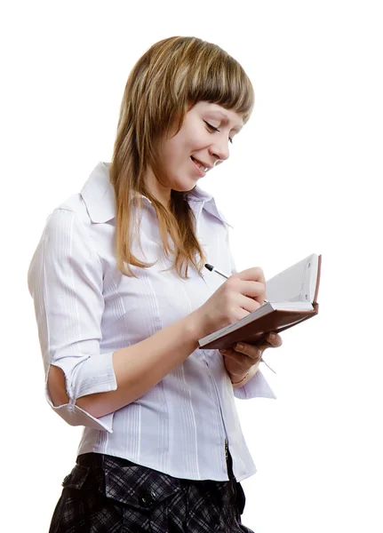 Young girl with a notebook Stock Picture
