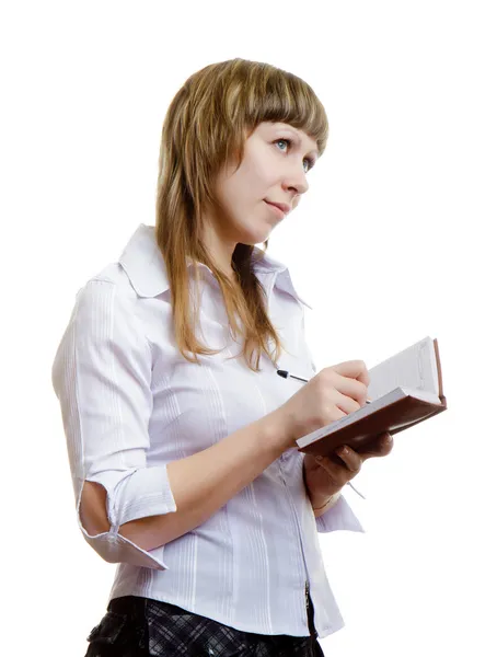 Chica joven con un cuaderno — Foto de Stock