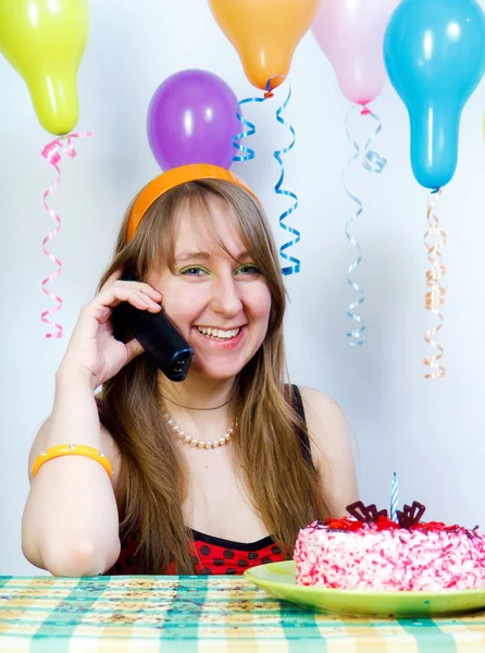 Birthday. Happy pretty girl with phone — Stock Photo, Image