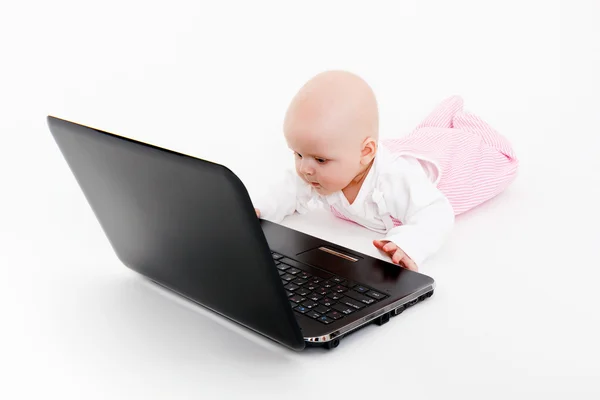 Bebé con portátil — Foto de Stock