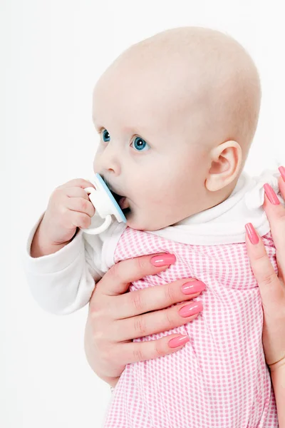 Baby girl with a pacifier — Stock Photo, Image