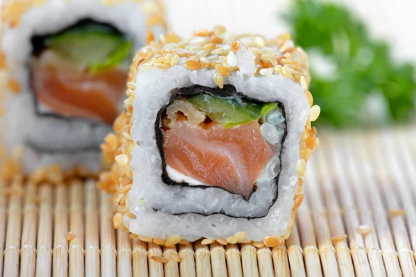 Sushi with salmon and cucumber — Stock Photo, Image