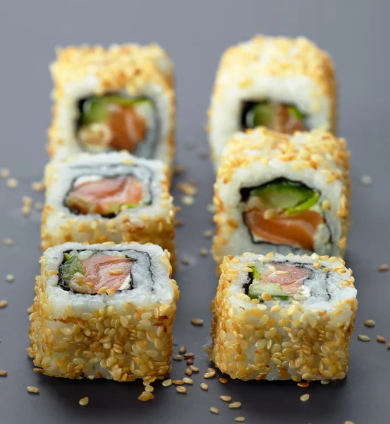 Sushi with salmon and cucumber — Stock Photo, Image